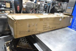 IN ORIGINAL BOX! CHCL04832HW LED Puff Light, 100-277 Volts. Box slightly damaged, unopened, with manufacturer markings.