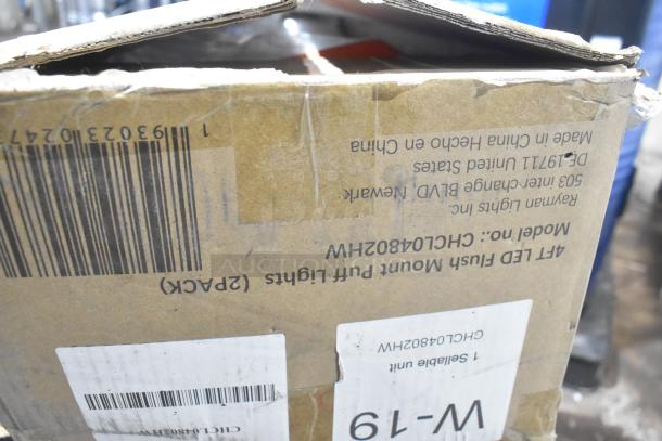 IN ORIGINAL BOX! CHCL04832HW LED Puff Light, 100-277 Volts. Box shows barcode and product labels.