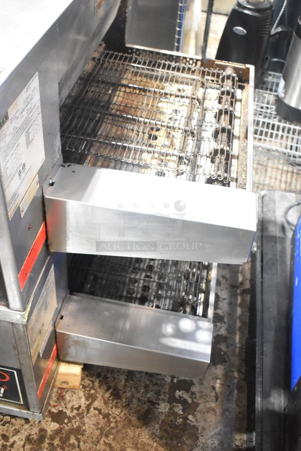 Middleby Marshall DZ33I stainless steel conveyor pizza ovens on casters, 208V, visible labels, used condition.