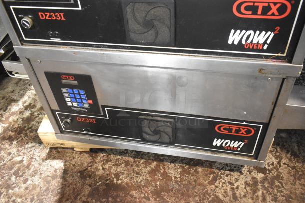 Two 2021 Middleby Marshall CTX DZ33I stainless steel conveyor pizza ovens on casters, 208V, 3/1 phase, in good condition.
