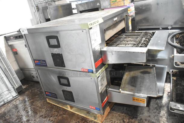 Pair of 2021 Middleby Marshall CTX DZ33T stainless steel conveyor pizza ovens on casters; 208V, 3/1 phase.
