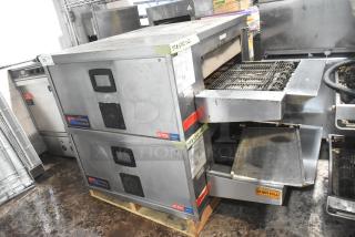 Pair of 2021 Middleby Marshall CTX DZ33T stainless steel conveyor pizza ovens on casters; 208V, 3/1 phase.