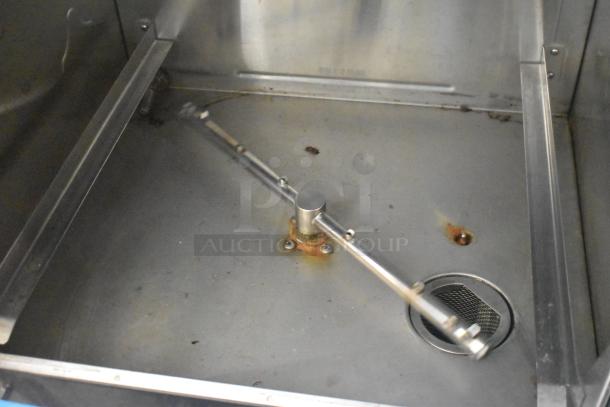 CMA L-1X16 undercounter dishwasher interior, stainless steel with spray arm, 115 volts, 1 phase, fair condition.