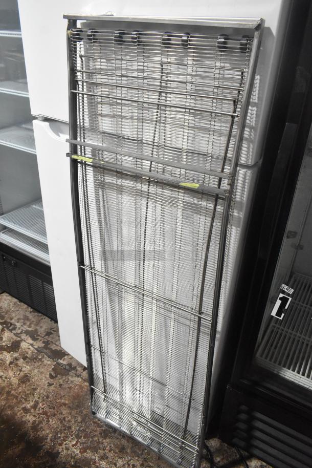 Brand new Lincoln 370677 conveyor assembly, 2ft, minor scratches and dents, stainless steel construction, vertical view.