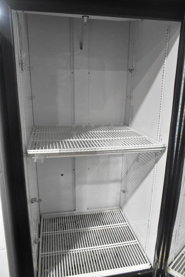 2019 True GDM-26-HC single-door reach-in cooler merchandiser. Two wire shelves, white interior, 115V, 1 Phase.