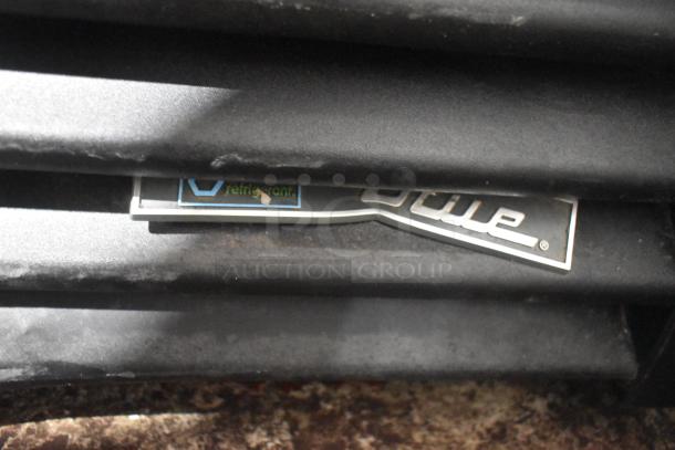 2019 True GDM-26-HC commercial cooler, label showing brand logo and refrigerant type, condition appears used.