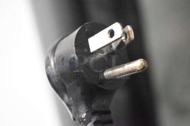 Close-up of a power plug for a 2019 True GDM-26-HC Commercial Single Door Reach In Cooler, 115 Volts, 1 Phase.