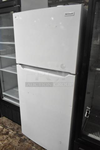 Brand new 2025 Frigidaire FFTR2045VWD cooler with freezer, 115 volts, 1 phase; minor scratch and dent visible.