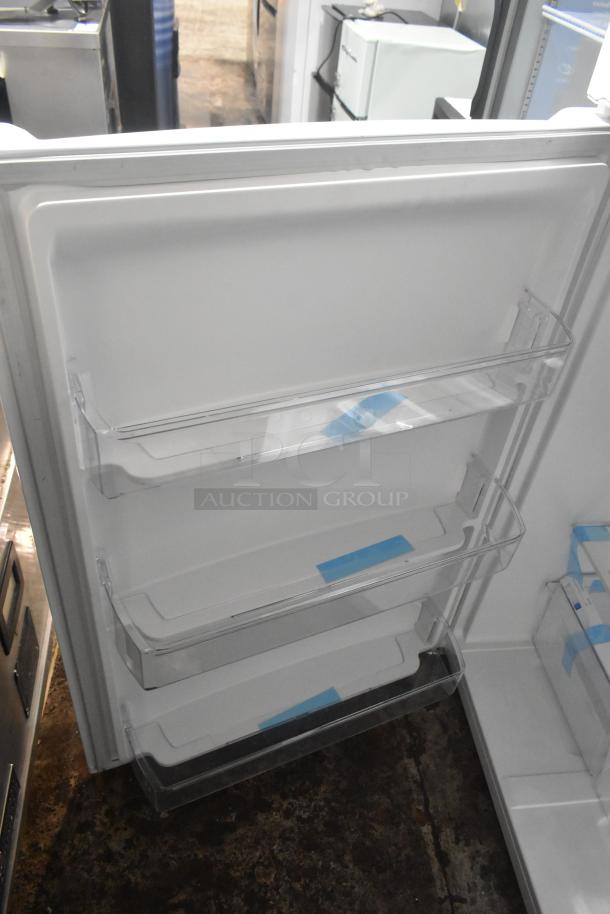 2025 Frigidaire FFTR2045VWD Cooler, brand new scratch and dent, 115 volts, 1 phase, clear door shelves visible.