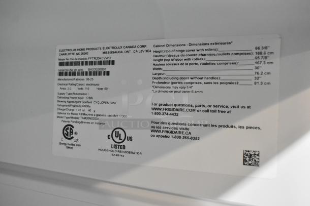 Close-up of label on Frigidaire FFTR2045VWD cooler with freezer. Shows dimensions, electrical ratings, and contact info.