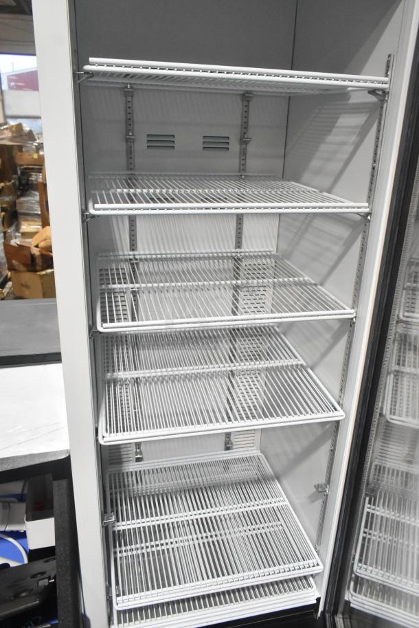 2019 Habco SE18 single door reach-in cooler, commercial use, 115 volts, 1 phase, 5 wire shelves, excellent condition.