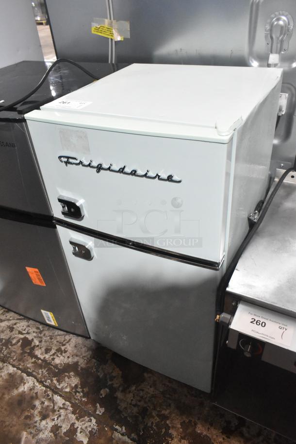 Frigidaire EFR840-MINT-6COM mini cooler with freezer, 115 volts, mint color, gently used, visible Frigidaire logo.