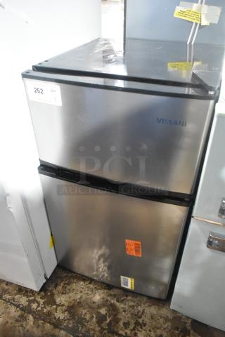 Vissani MDCM31SS5 Mini Cooler with freezer, stainless steel, 115V, 1 Phase. Visible labels include auction tag.