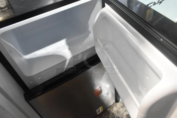 Vissani MDCM31SS5 Mini Cooler with Freezer in new condition, 115 volts, 1 phase, interior and door view.