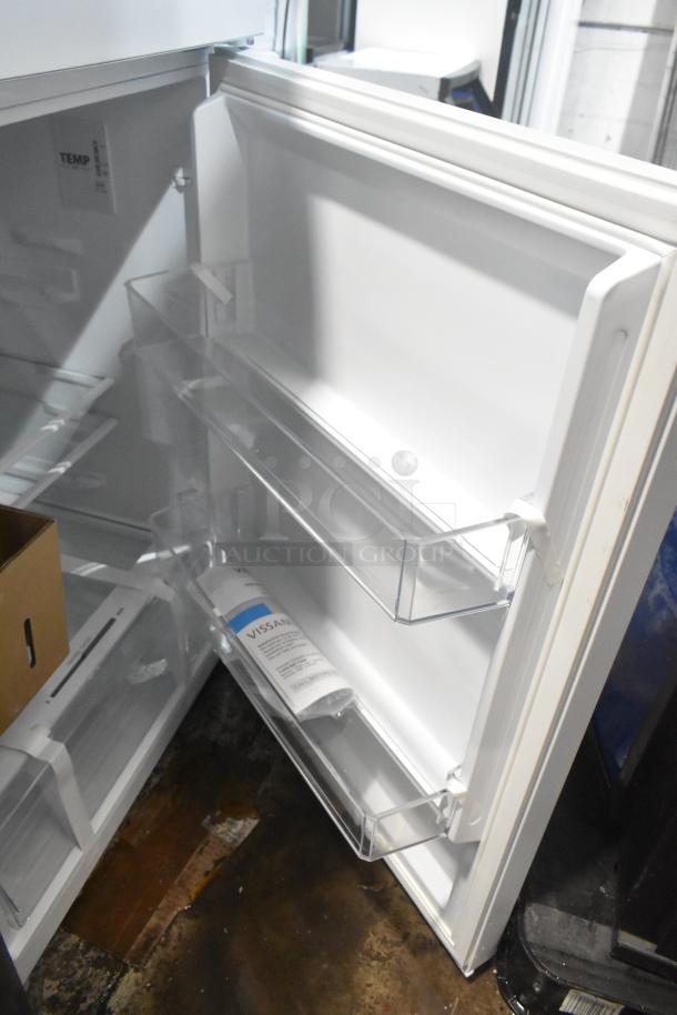 Vissani MDTF14WH5 Cooler with Freezer, 115 Volts, 1 Phase, shown in open condition with clear storage shelves.