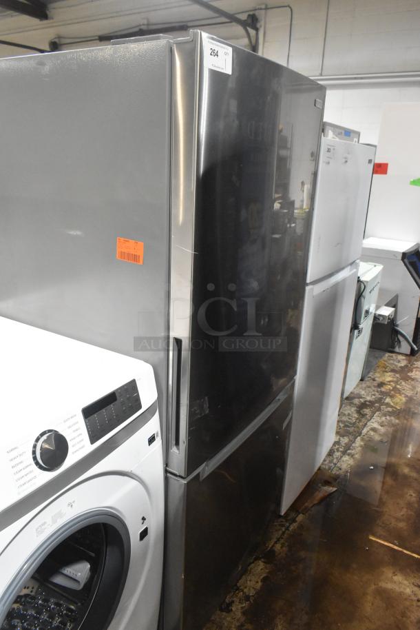 Reach In Cooler with Freezer Drawer, stainless steel, 115 volts, 1 phase, slight wear, auction tag "264" visible.