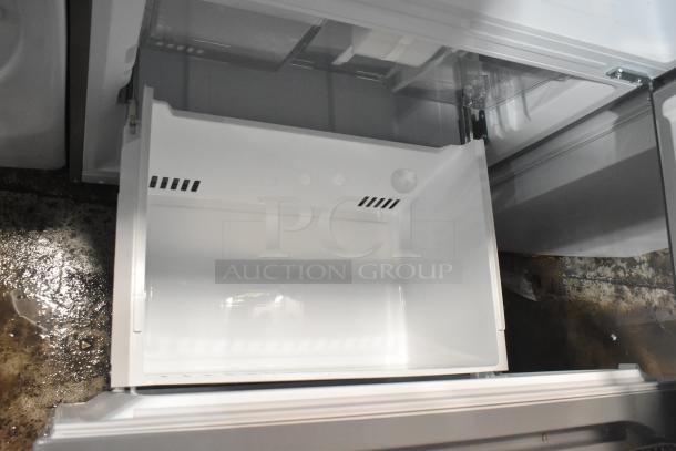 Reach-In Cooler with Freezer Drawer, white interior, 115 volts, 1 phase, clean condition, open drawer view.