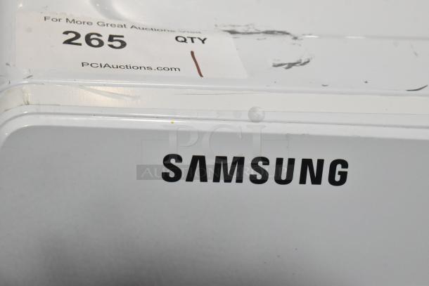 Samsung WF45B6300AW front load washer, visible label showing auction number 265, 120 volts, one phase.