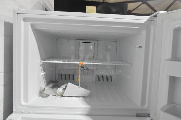 Vissani MDTF18WHR Reach In Cooler w/ Freezer, 115V, 1 Phase. Interior shot showing a shelf, control dial, and tags.