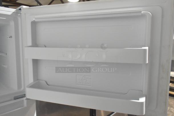 Vissani MDTF18WHR reach-in cooler with freezer interior door shelves, 115V, 1 Phase, in good condition.