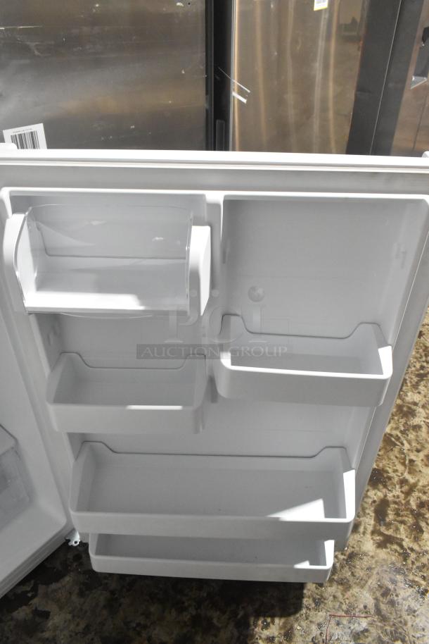 Vissani MDTF18WHR Reach In Cooler with Freezer, interior door view, 115V, 1 Phase, multiple storage shelves.