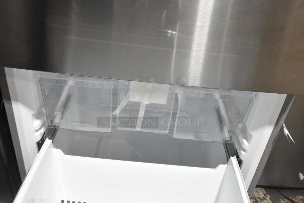 Vissani reach-in cooler with freezer drawer, stainless steel finish, 115 volts, 1 phase, in excellent condition.