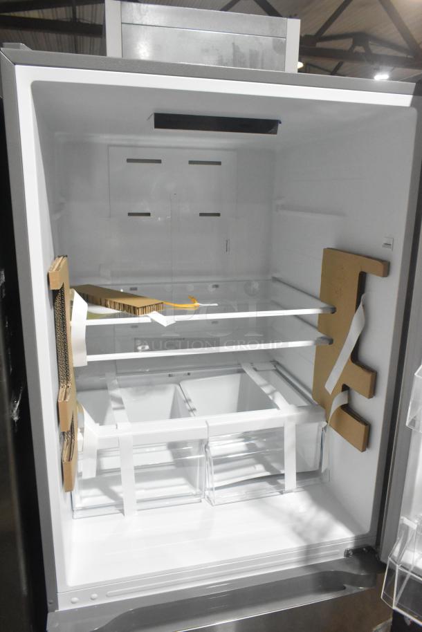 Vissani Reach In Cooler with Freezer Drawer, 115 volts, 1 phase. Features include multiple shelves and storage bins. New condition.