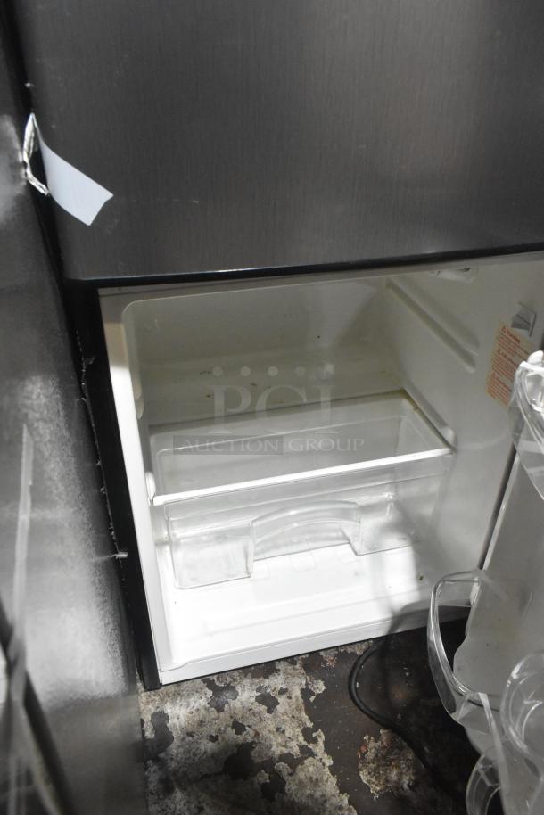 Magic Chef HMDR310SE Mini Cooler with Freezer, 115 Volts, 1 Phase, shows interior shelving; clean condition.