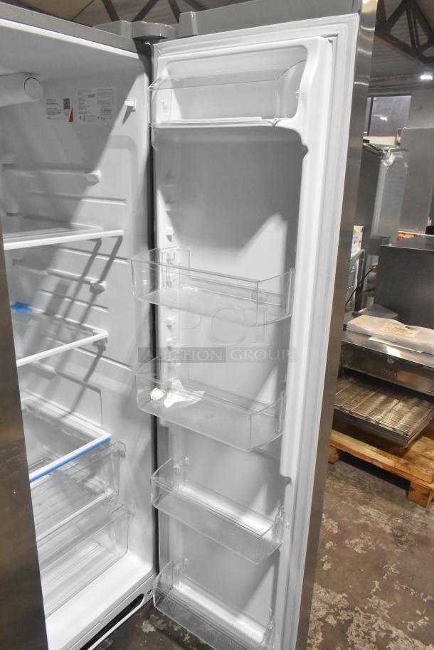 2025 Frigidaire FRSS2628ASN reach-in cooler with freezer, ice/water dispenser, 115V, 1 Phase. Spacious shelves, pristine condition.