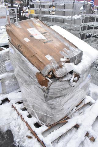 Pallet of three new scratch and dent items wrapped in damaged cardboard and plastic. Includes sink and ingredient bin.