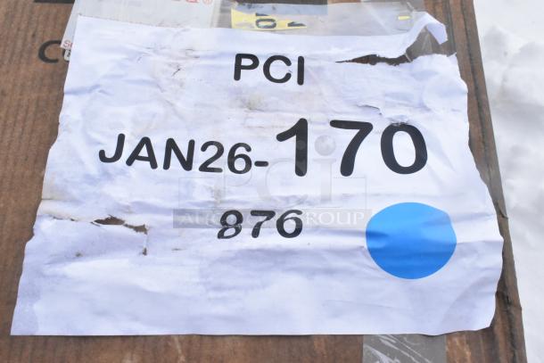 White label marked "PCI JAN26-170 876" with a blue dot on a scratched surface.