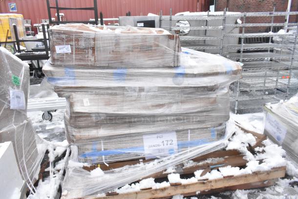 Wrapped pallet with 9 new scratch and dent items, including squeegee and strip warmer. Pallet marked "POI JAN26-172 876."