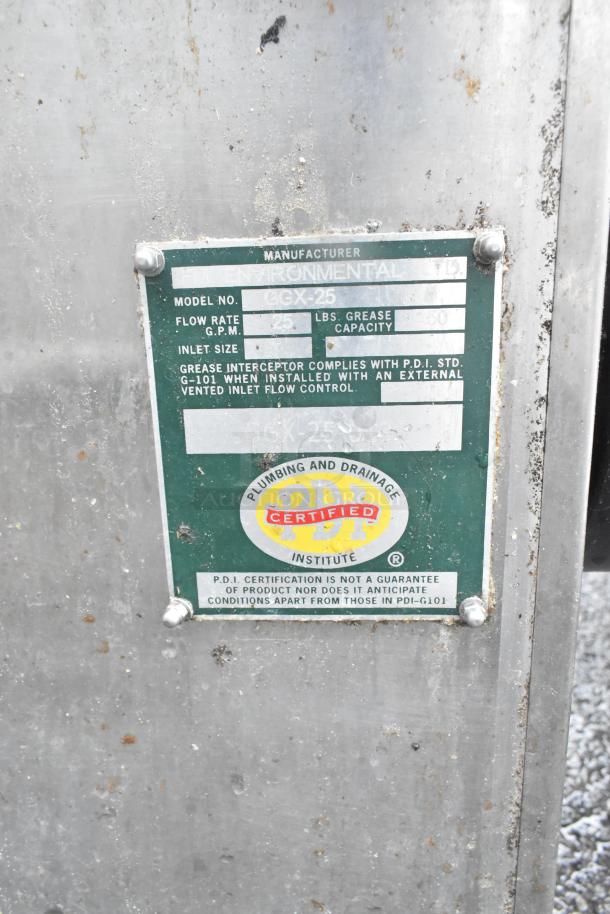 Environmental GGX-25 grease trap, 50 lb capacity, complies with P.D.I. standards. Model info plate visible, in used condition.