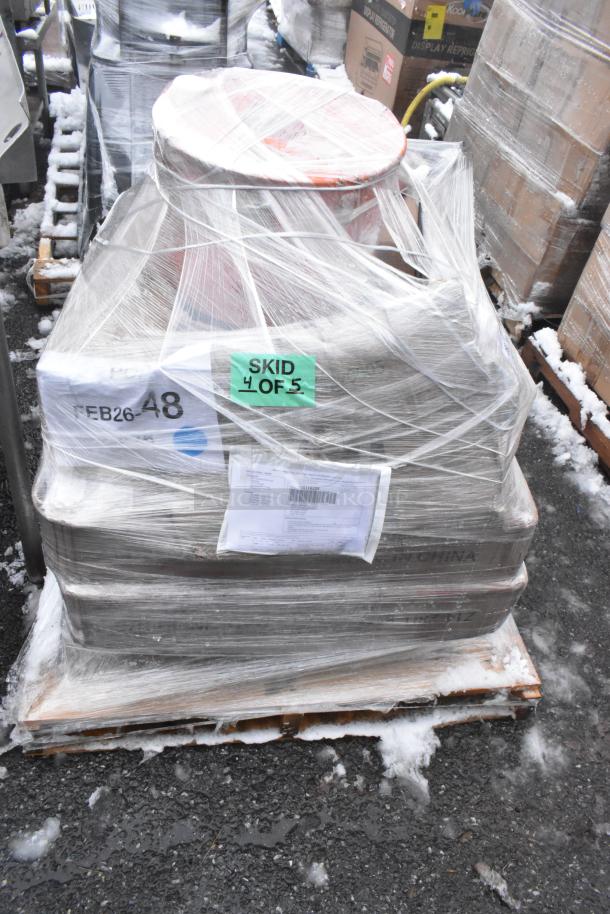 Pallet with shrink-wrapped items, labeled "SKID 4 OF 5." Includes fillet table, oil pail, condition noted as scratch and dent.
