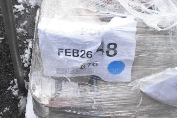 Shrink-wrapped auction pallet labeled "FEB26 48," contains new scratch and dent items, including a fillet table and oil pail.