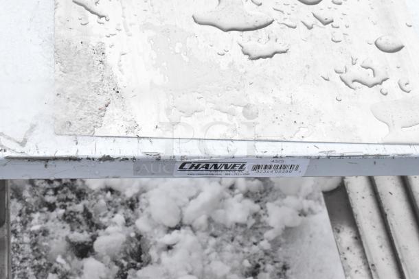 Channel commercial pan rack on casters, model 432S. Visible wear and watermarks; barcode label intact.