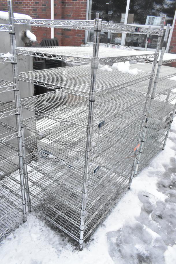 Chrome finish 10-tier wire shelving unit in good condition. Buyer must dismantle for transport; freight charges apply.
