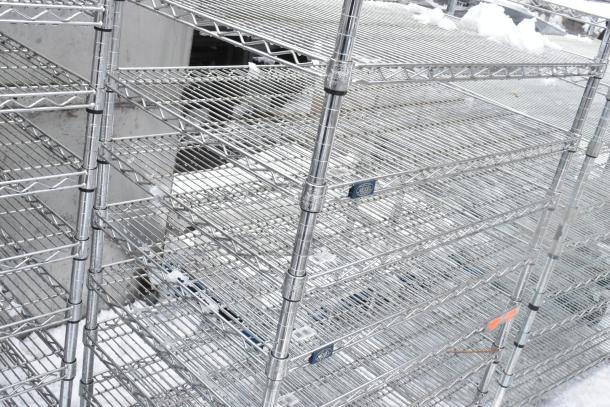 Chrome finish 10-tier wire shelving unit, excellent condition. Includes manufacturer labels. Buyer dismantles.