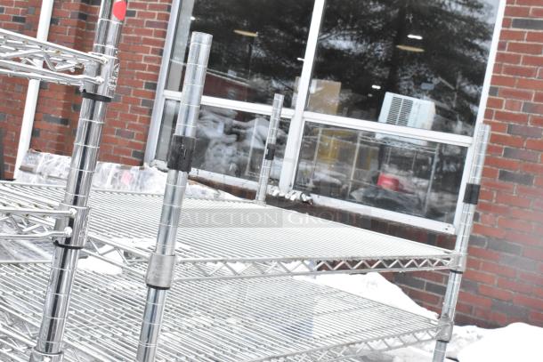 Chrome finish 9 tier wire shelving unit, sturdy design, outdoor setting. Buyer must dismantle, shipping not included.