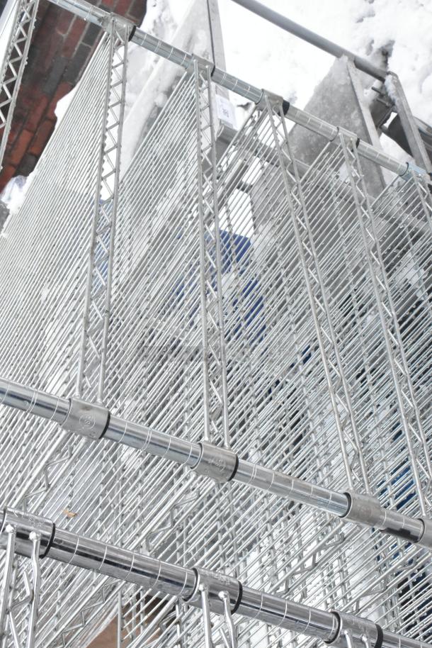 Chrome finish 9 tier wire shelving unit, sturdy design, buyer must dismantle. Ideal for storage, consider freight charges.