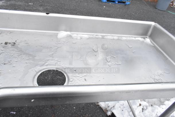 Commercial right-side dirty dish table, stainless steel, with drain hole. Surface shows signs of use. Suitable for restaurant kitchens.