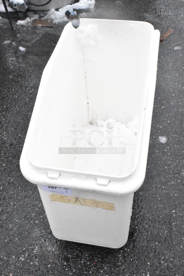White poly ingredient bin on commercial casters, visible wear, auction tag labeled "297" and tape marked "SALT."