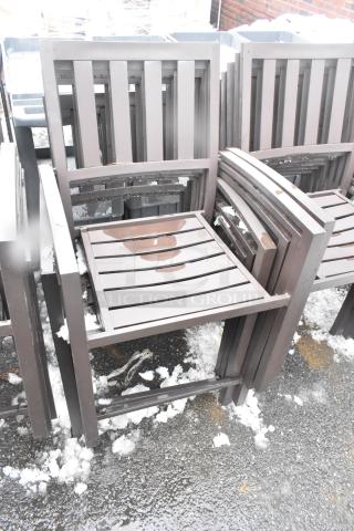 26 brown outdoor arm chairs, slatted design, stacking, durable metal, light snow, excellent condition. Auction lot size 26.