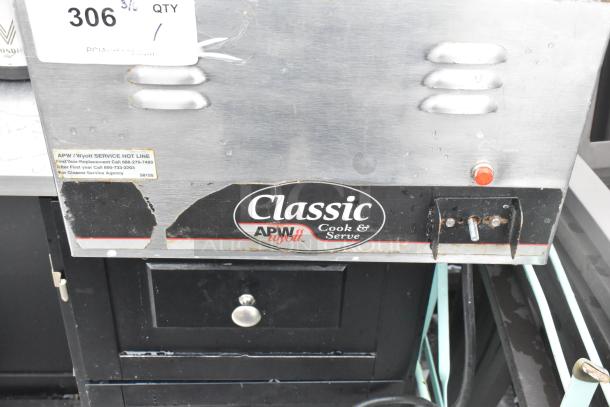APW Wyott CW-2A Countertop Food Warmer, 120V, 1 Phase, classic design, visible service hotline label, good condition.