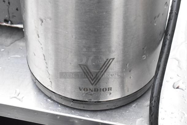 Vondior air pot, stainless steel, missing lid, brand logo visible, slight water droplets, used condition.