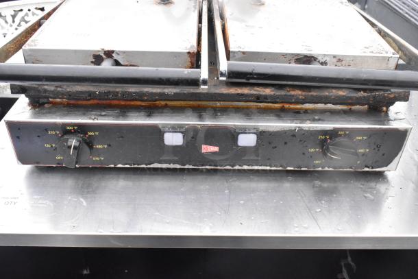 Cecilware Countertop Double Panini Press with temperature dials, visible wear, and rust. Ideal for sandwich grilling.