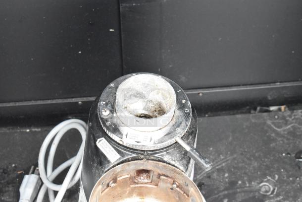 Mazzer Luigi Mini Timer espresso bean grinder base, model Mini Timer, 120 volts, visible wear, adjustment knob labeled fine to coarse.