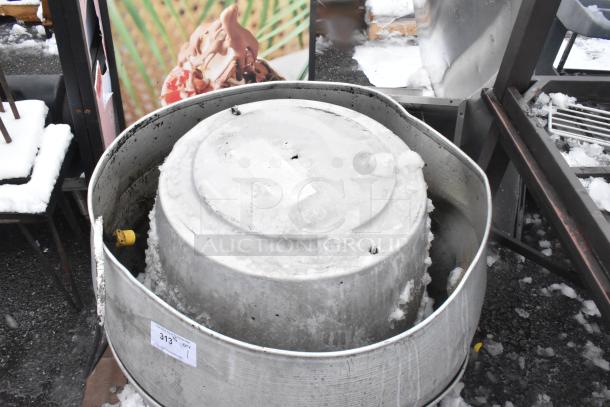 Mushroom rooftop exhaust fan with visible ice, metal casing, and label "313." Used, outdoor condition.