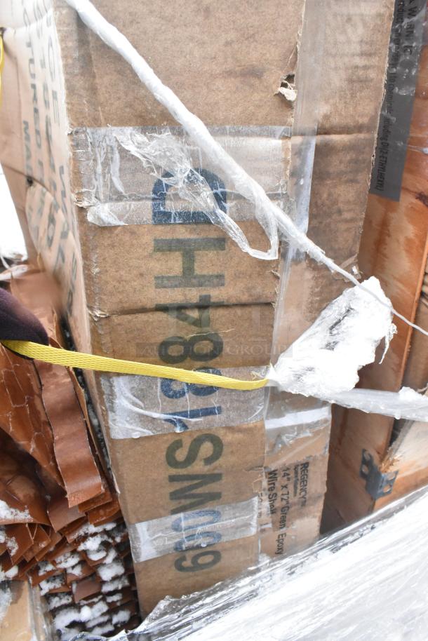 Packaging of 8 brand new items marked with scratches and dents, including a shelf and wire shelves. Boxes show wear.