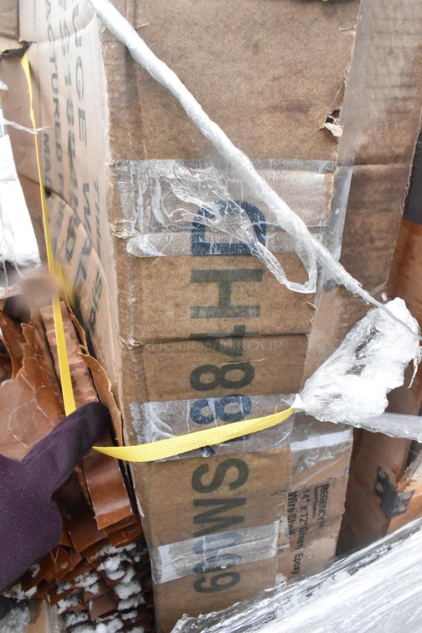 New scratch and dent lot including shelf, wire shelves, tabletop. Items packed in cardboard boxes, some damage visible.